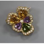 A yellow metal, coloured quartz and seed pearl set flower head brooch, 23mm.