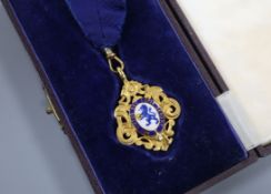 A cased 1930's 9ct gold and enamel commemorative medallion, inscribed en verso, 'Borough of