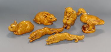 Six yellow glazed pottery animals