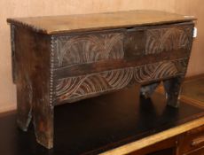 A 17th century small oak six plank coffer W.89cm