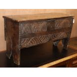 A 17th century small oak six plank coffer W.89cm