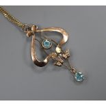 An Art Nouveau 9ct and blue zircon set drop pendant, on a later 9ct chain, pendant 4cm.