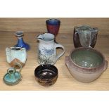A collection of art pottery, some signed