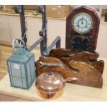 A pair of cast iron andirons, a whip rack, an American clock and metalware