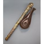 An Indian silvered and gilded copper processional staff and a copper libation cup longest 56cm