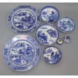 A pair of 18th century Chinese blue and white plates, four saucers and two covers