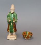 A Chinese green and rust glazed figure and a similar cup, Ming and Tang dynasty