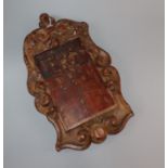 A 19th century Russian or Greek painted wood icon, cartouche frame