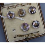A cased set of early 20th century five (ex 6) 18ct and shell set dress studs.
