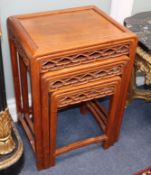A nest of three Chinese hardwood tables W.42cm