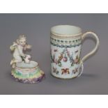 A Berlin figural salt and a Dresden mug height 11.5cm