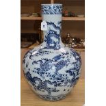 A Chinese blue and white dragon vase height 58cm