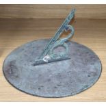 A bronze sundial with gnomon, of star design, inscribed 'Brixton 1795', dia 46cm, H 45cm (max)