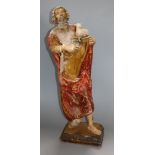 An 18th/19th century carved painted figure of Moses