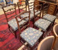 A harlequin set of six George III mahogany ladderback dining chairs, with upholstered seats and