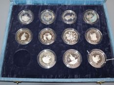 A 70th Birthday Silver Proof Collection, cased (one coin deficient), sundry commemorative coinage