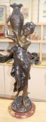 An Art Nouveau style bronze of a female water carrier height 92cm