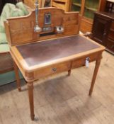 A Continental mahogany desk W.91cm