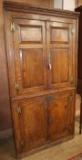 A mid 18th century ash standing corner cabinet W.99cm