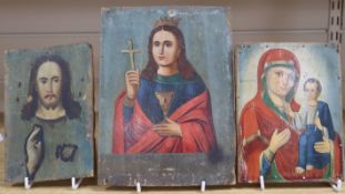 Three Russian painted wood icons, 19th/20th century largest height 23cm