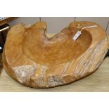 A large carved elm bowl length 63cm