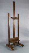 A late Victorian oak artist's studio easel, W.2ft H.6ft 8in.