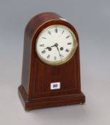 A French inlaid mahogany arched mantel clock