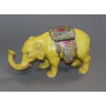 A Samson of Paris yellow model of a caparisoned elephant in Chinese style width 24cm