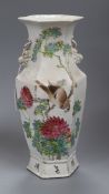 A Chinese famille rose hexagonal baluster vase, Guangxu period, painted with a bird amid pink