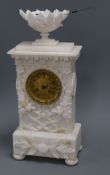 A 19th century French carved alabaster clock