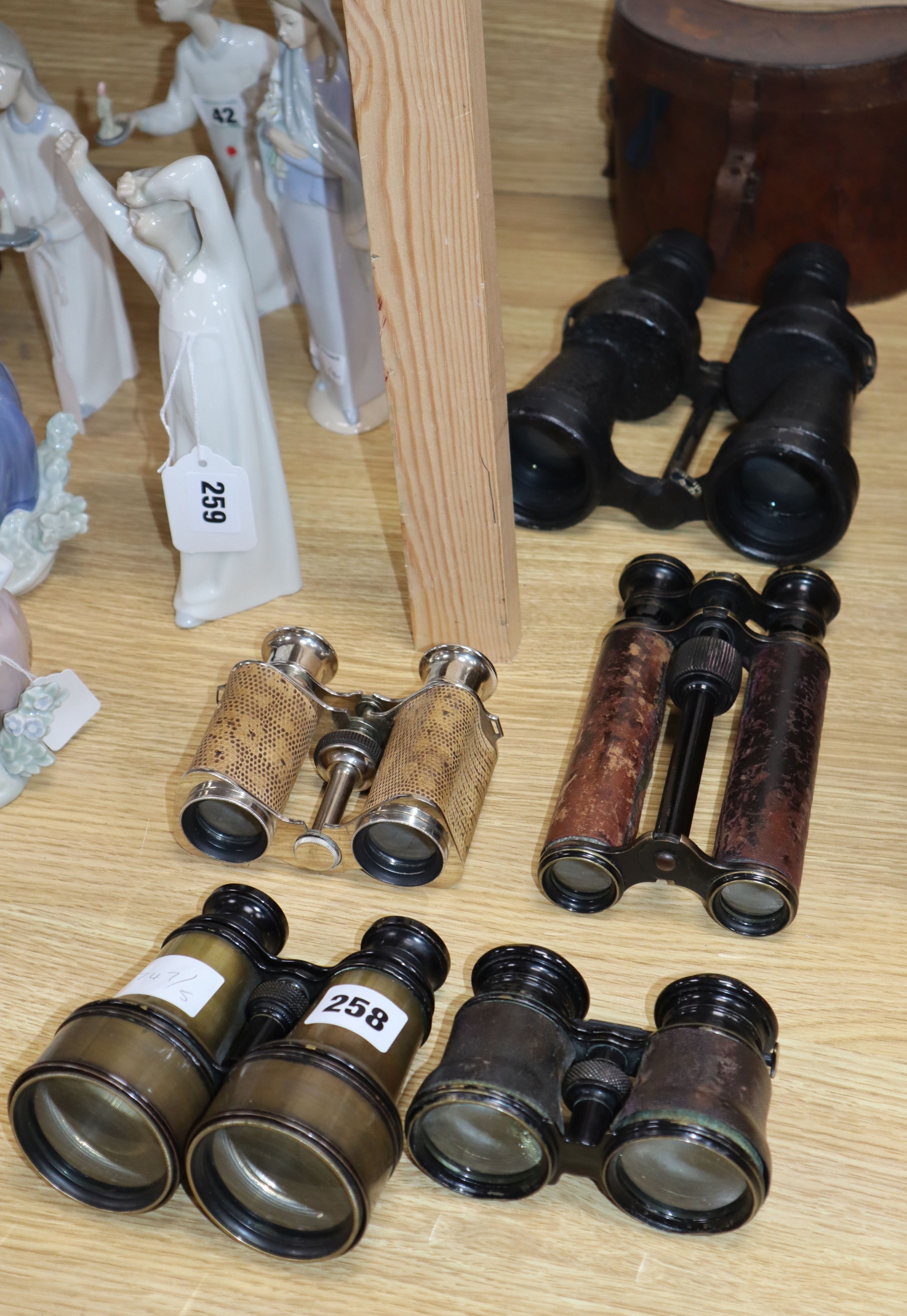 Six pairs of various binoculars