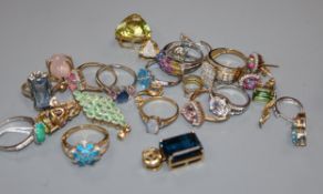 Eight assorted modern 9ct gold and gem set dress rings, seven similar assorted 9k and gem set