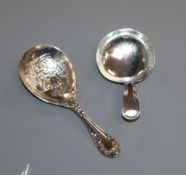 A George III silver Old English thread pattern caddy spoon and a late Victorian caddy spoon with