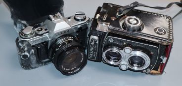 A Yashica camera and a Canon camera