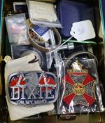 A mixed collection of military badges etc., including Hitler stamps