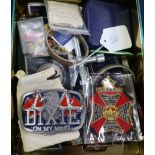 A mixed collection of military badges etc., including Hitler stamps