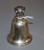 A silver hand bell with owl finial, Wakely & Wheeler, London, 1958 84mm.