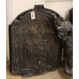Two cast iron fire backs larger 76cm high