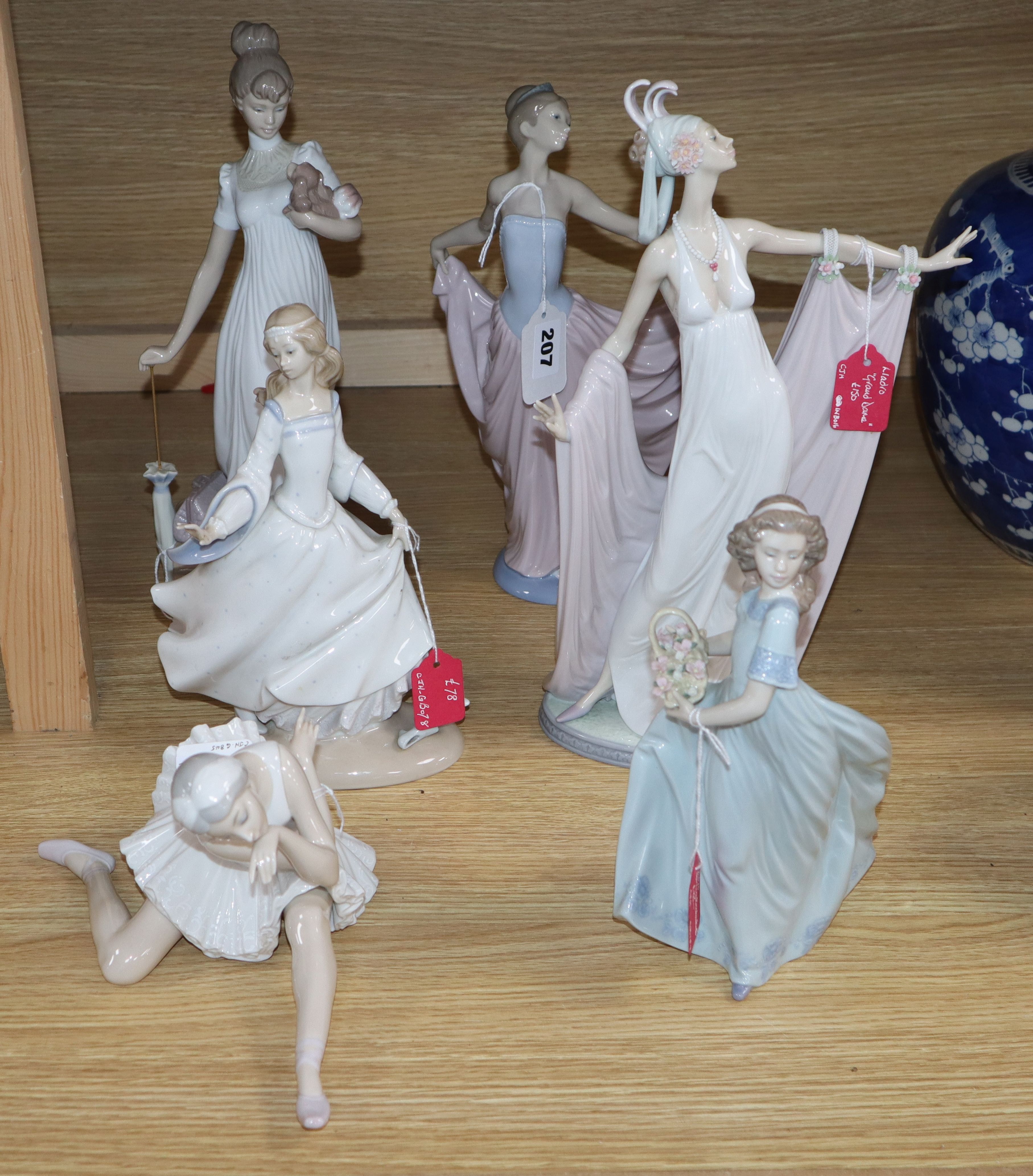 Six Lladro figurines: Travelling Companions, Cinderella, Spring Enchantment, Death of a Swan,