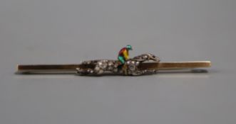 An early 20th century yellow metal, rose cut diamond and enamel set jockey & horse bar brooch, in