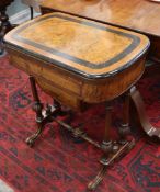 A Victorian walnut games/work table W.64cm