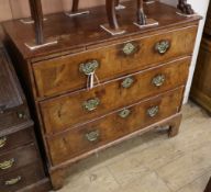 An 18th century and later walnut three drawer chest (formerly the base of a tallboy) W.100cm