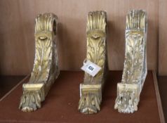 A set of three giltwood and gesso rail brackets H.36cm