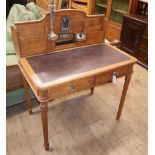 A Continental mahogany desk W.91cm