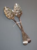 A pair of George III silver later embossed Old English pattern berry spoons, Godbehere & Wigan,