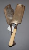 A Victorian silver King's pattern fish slice, London, 1846 and a silver and ivory crumb scoop.