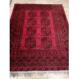 An Afghan carpet 195 x 150cm