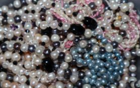 A group of assorted modern mainly cultured pearl necklaces.