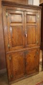 A mid 18th century ash standing corner cabinet W.99cm