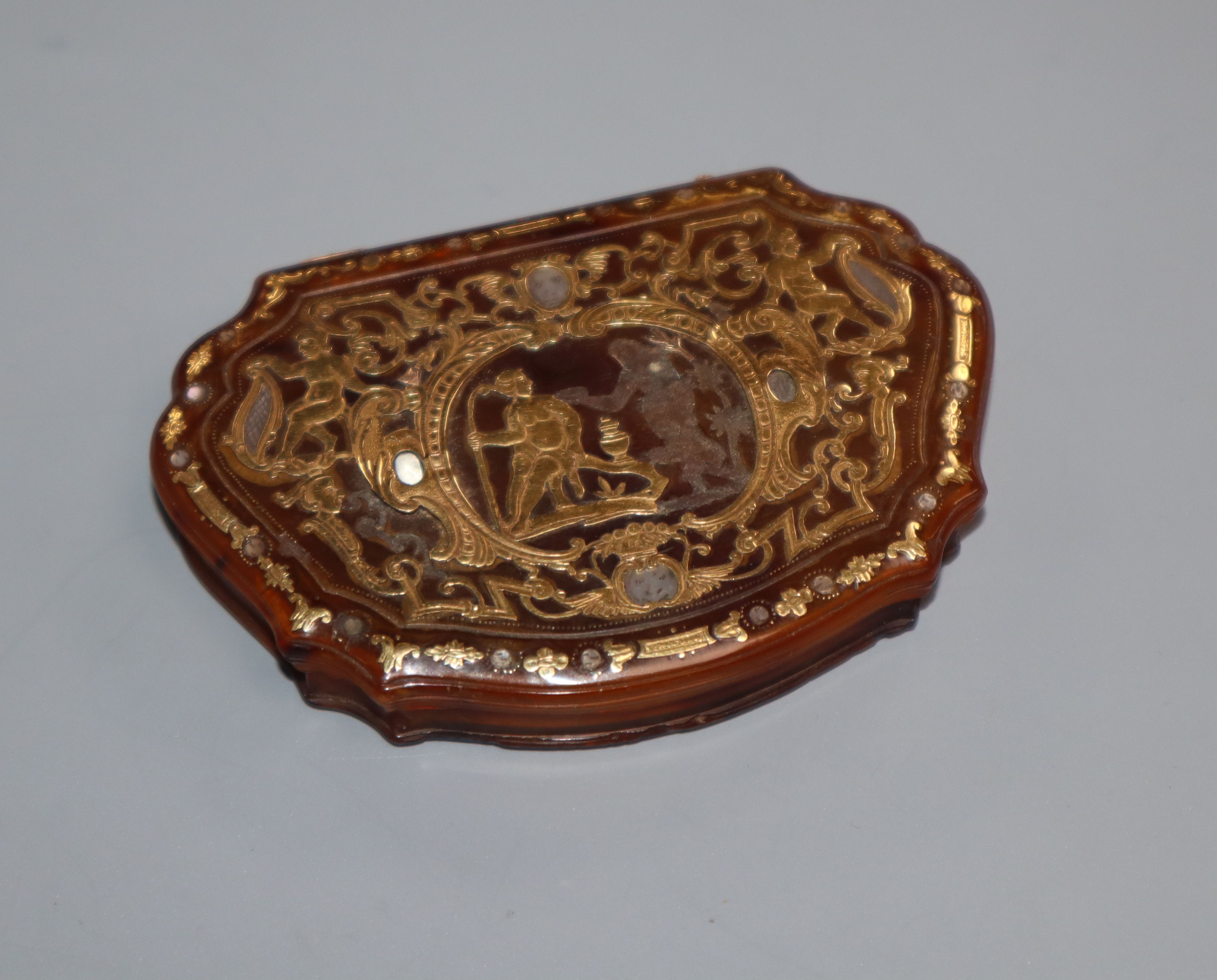 An 18th century gold overlaid tortoiseshell snuff box